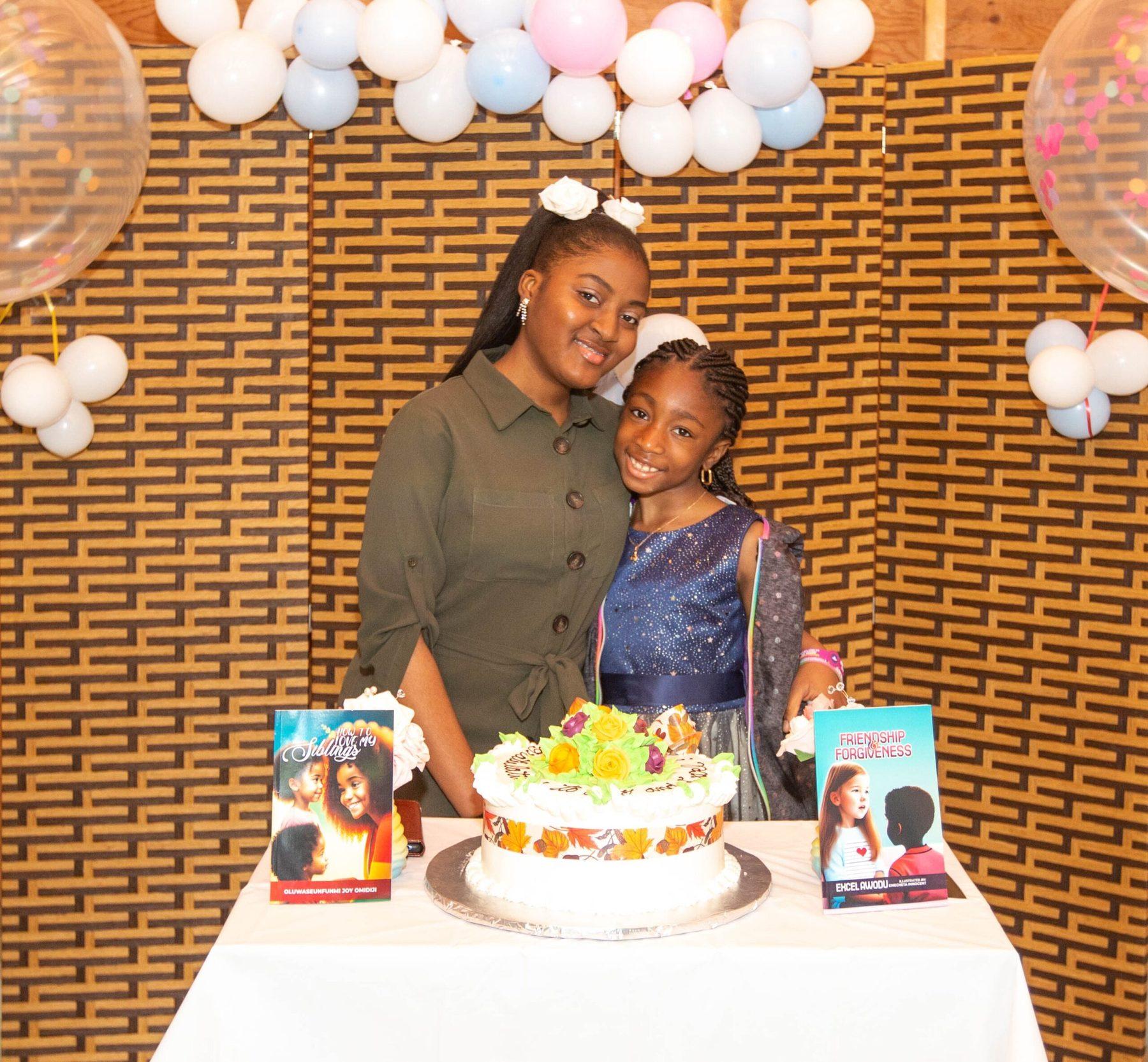 A young author celebrating her book launch