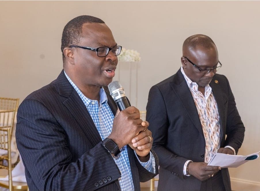 A guest speaks during the recognition program.